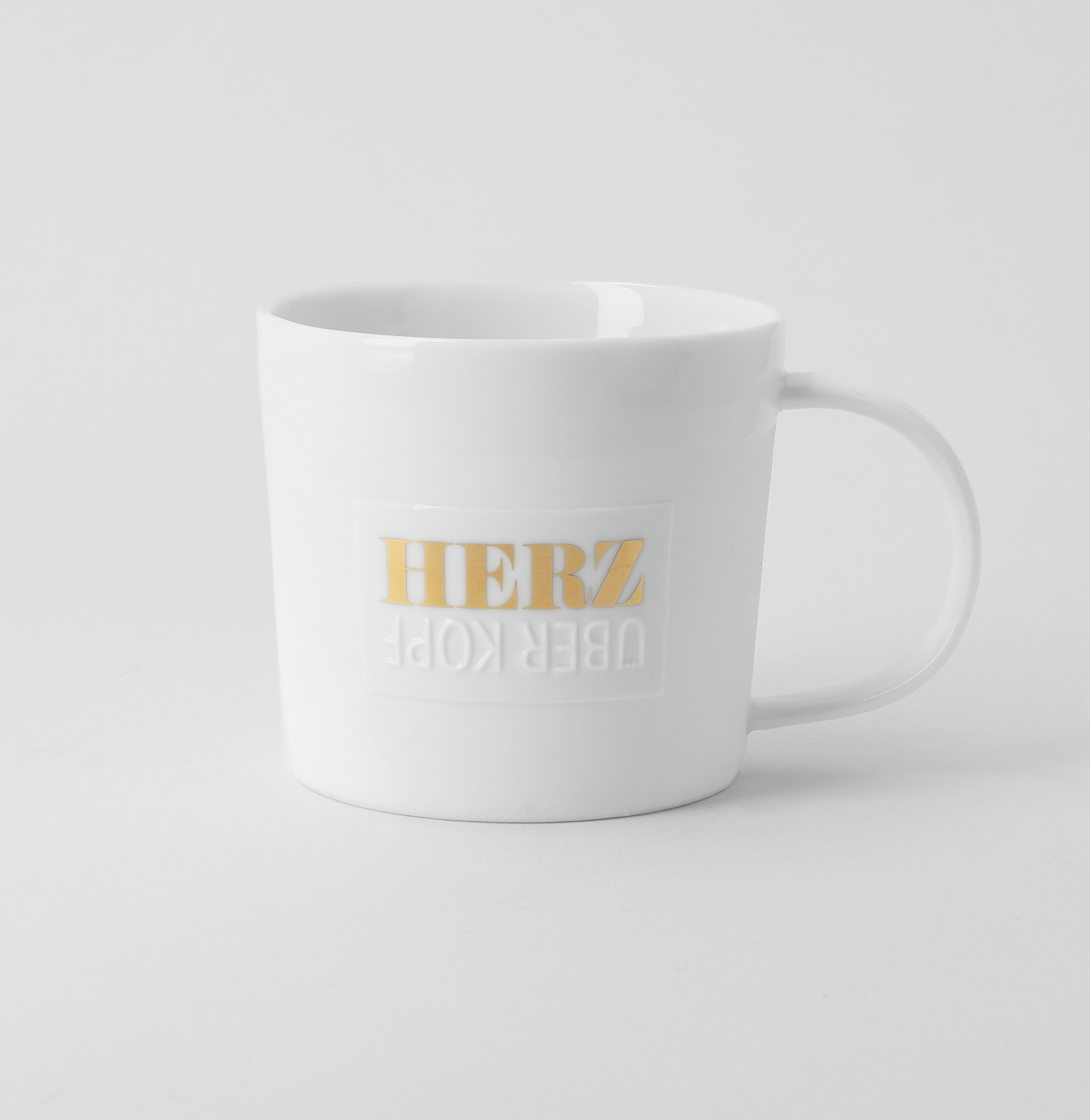 Räder Poesietasse "Herz über Kopf"